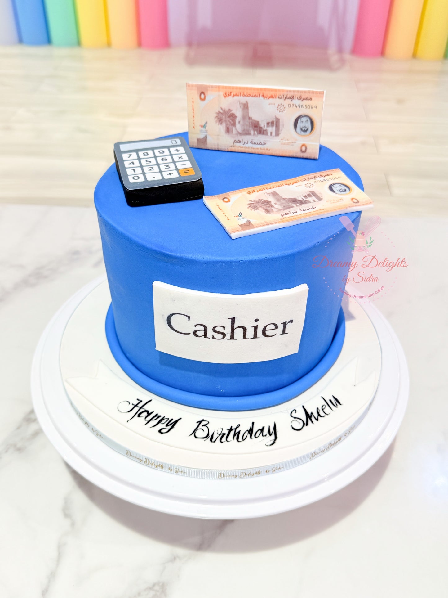 Cashier cake with money themed design birthday cake for him in Dubai