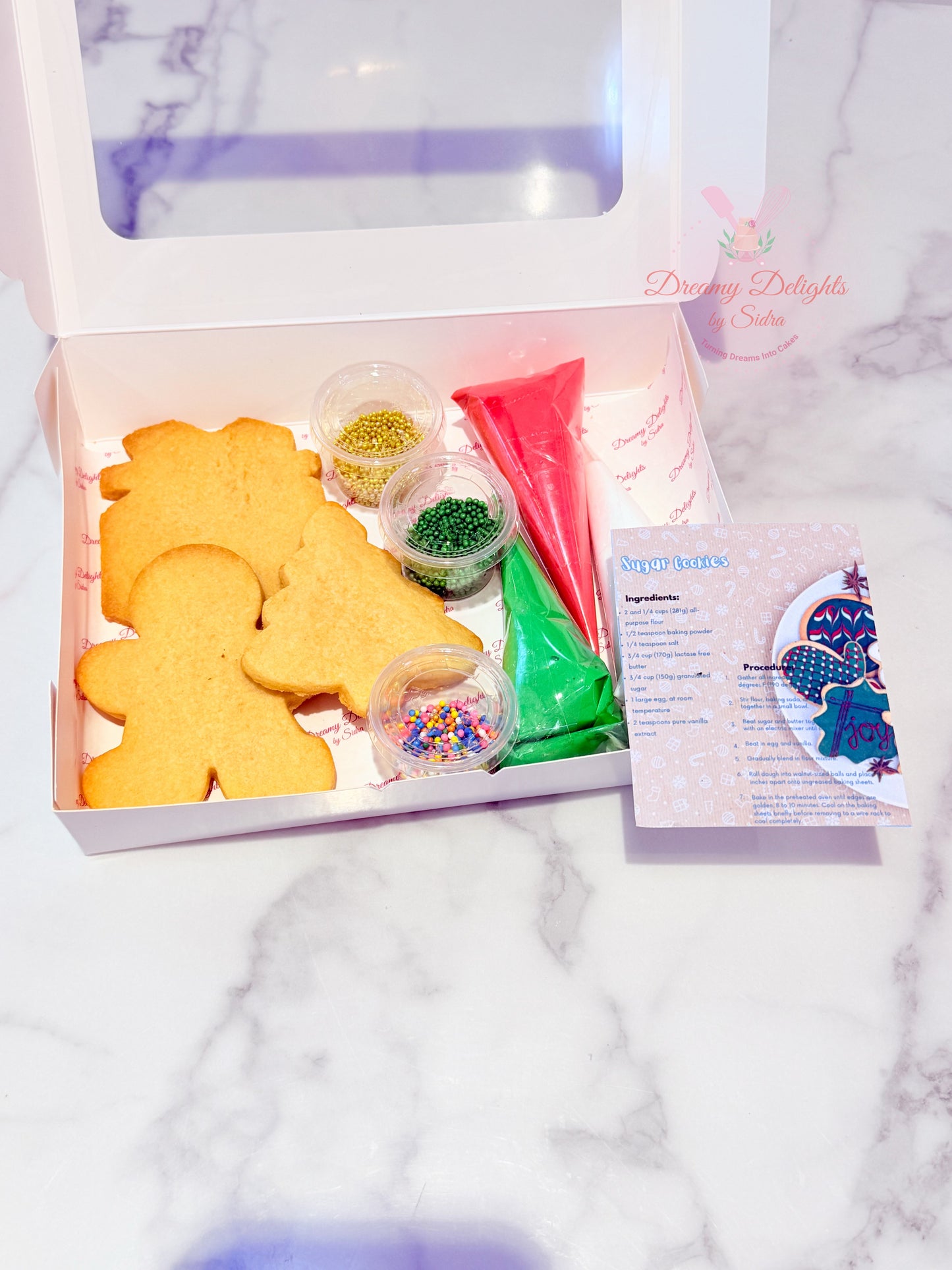 DIY Christmas cookie kit with icing and sprinkles, perfect for kids, families, and festive decorating activities, freshly made