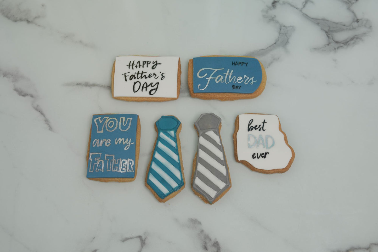 Father's Day Tie Cookies featuring necktie designs, Father's Day messages, and Best Dad decorations in Dubai for Father's Day 2026