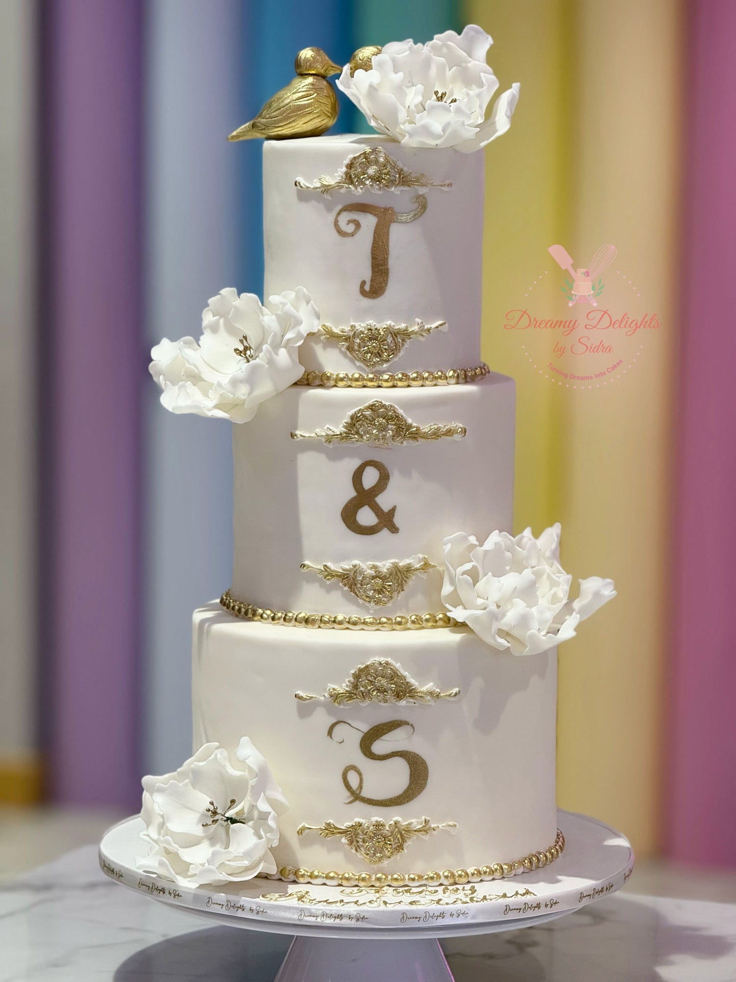 Elegant Gold Birds Wedding Cake