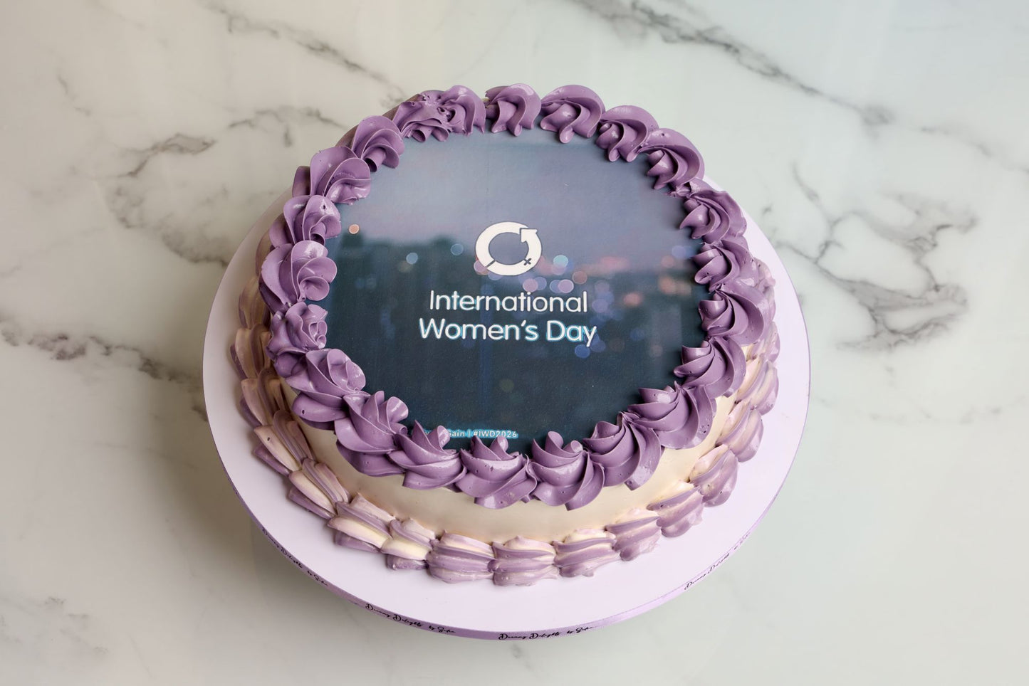 International Womens Day corporate celebration cake with edible womens day topper for office event in Dubai