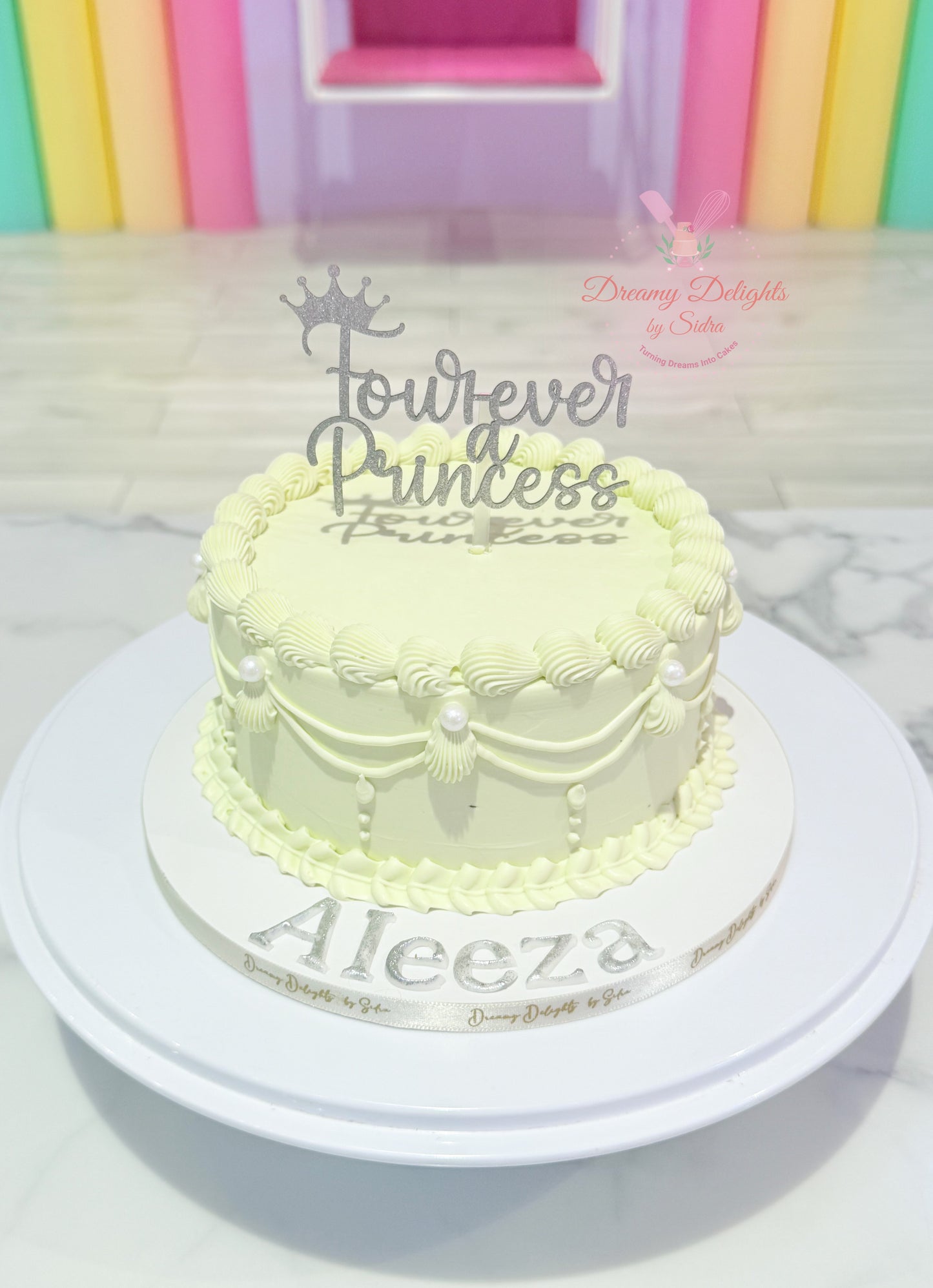 Custom princess birthday cake with glitter topper for girls party in Dubai