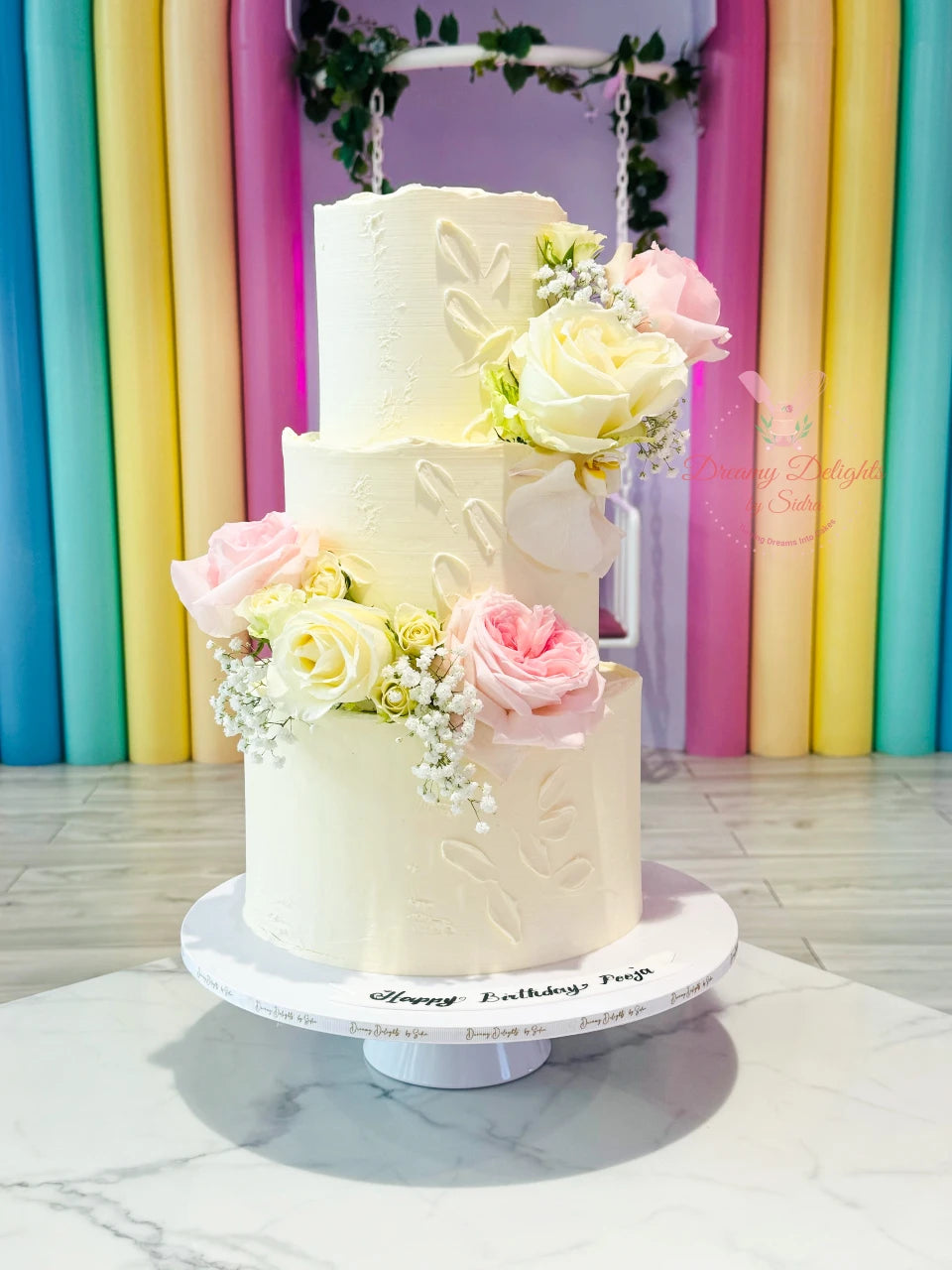 White and Pastel Flower Cake