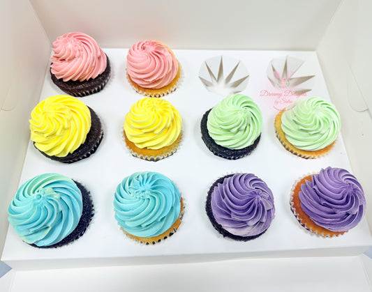 Assorted colorful cupcakes in a box