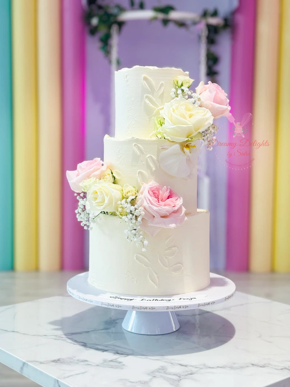 White and Pastel Flower Cake