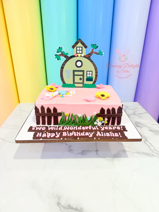 Birthday cake with a treehouse topper against a colorful background