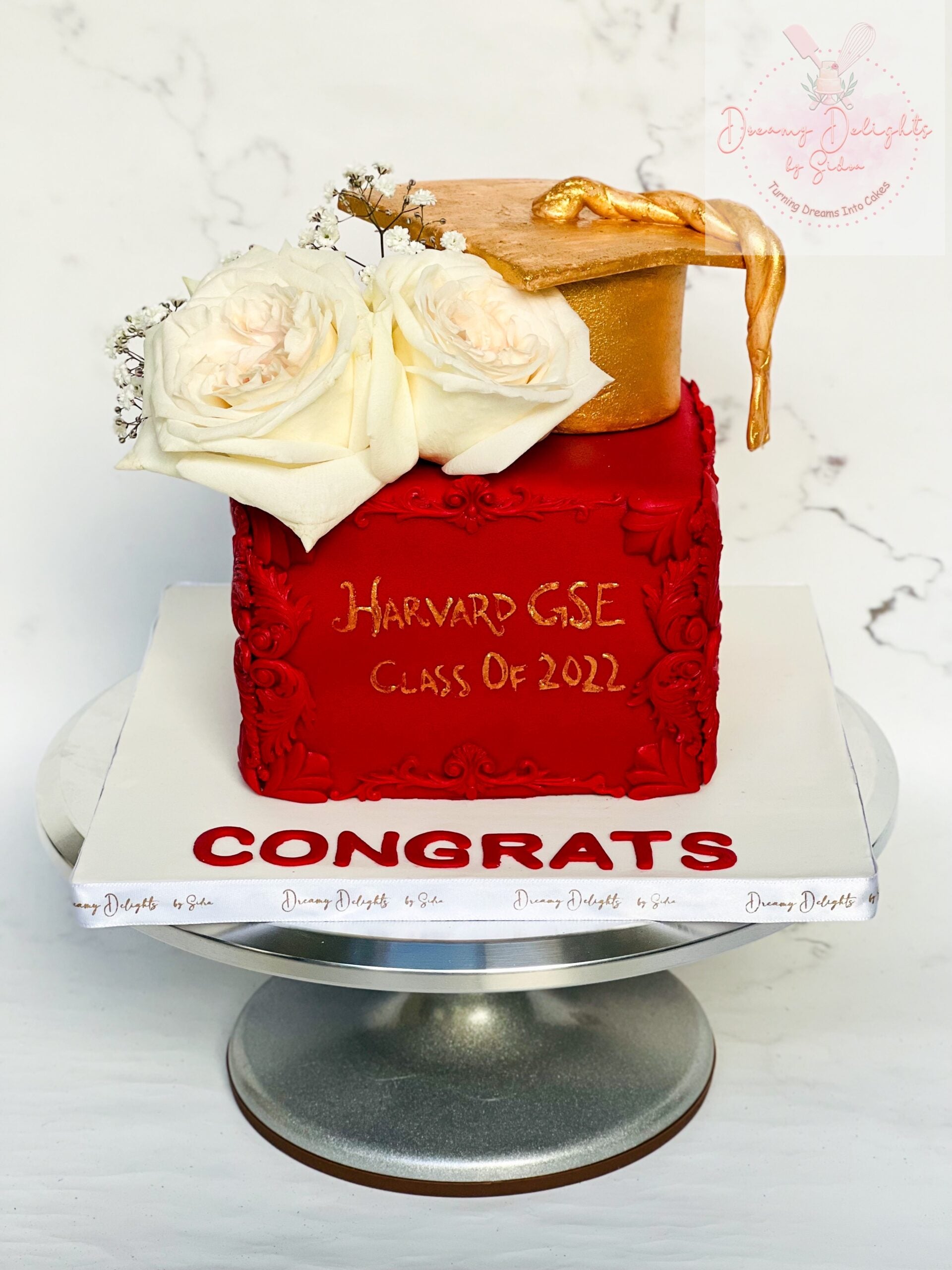 Floral graduation cake for her Dubai — custom celebration cake by Dreamy Delights by Sidra