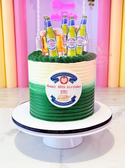 Birthday cake with green and white striped design and beer bottles on top, against a colorful background.