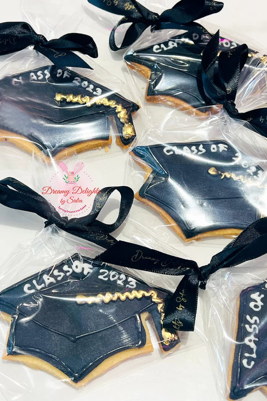 Personalised graduation cookies in Dubai with custom names for school completion or nursery graduation party favors
