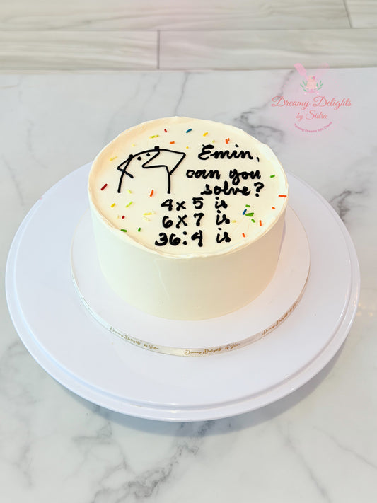 Minimalist age calculation bento cake with personalized handwritten birthday message and funny math puzzle in Dubai.