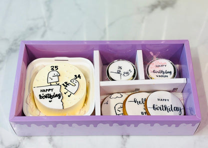 Age Kick themed bento cake bundle with doodle design cake, cupcakes, and cookies in Dubai