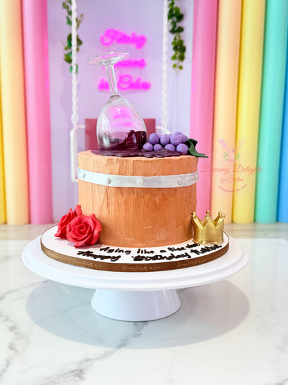 Age like fine wine cake with wine barrel and glass theme