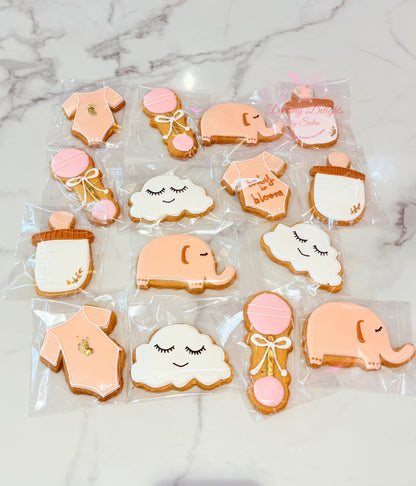 Elephant baby shower cookies with baby onesie and cloud designs Dubai
