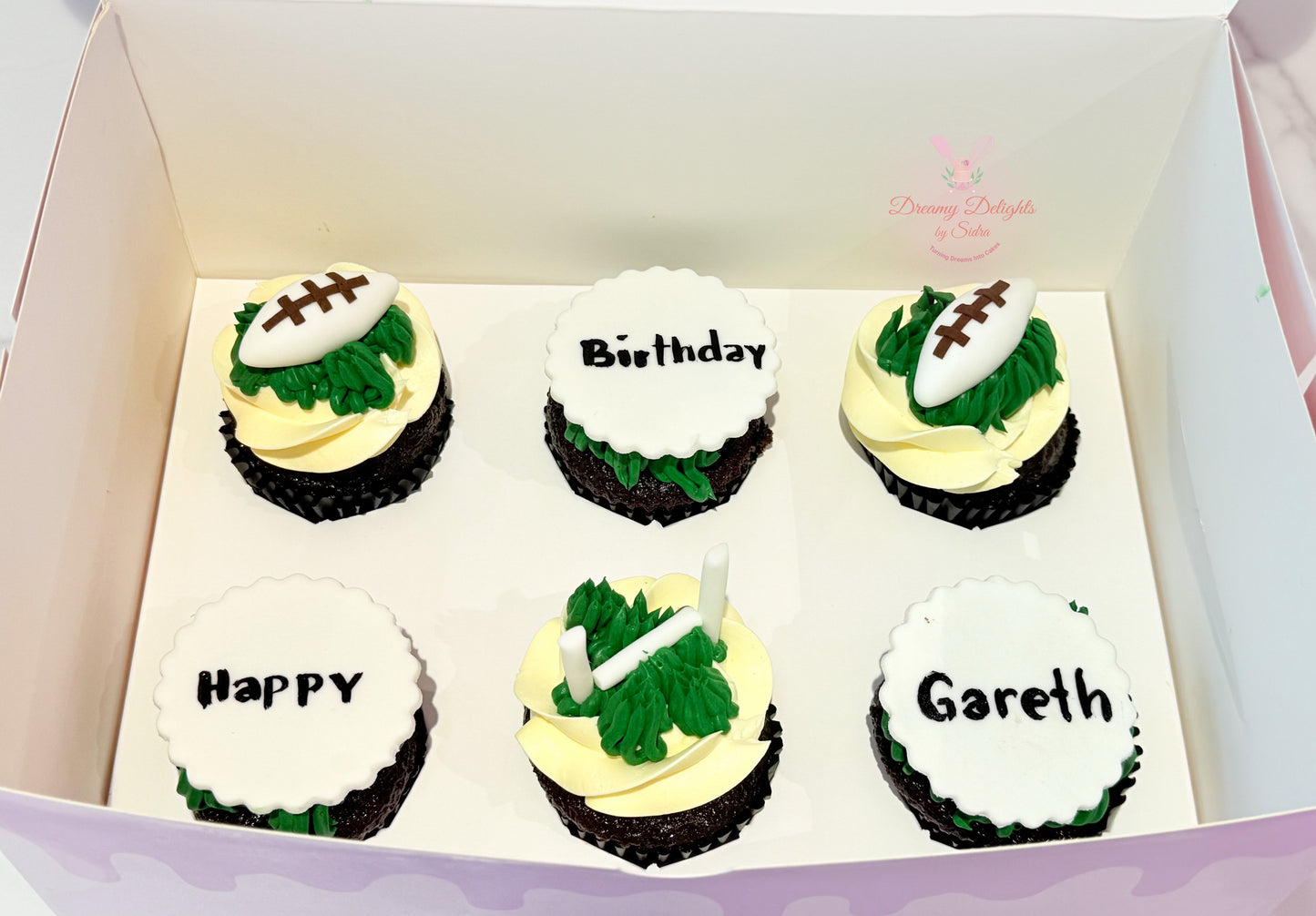 Baseball birthday cupcakes with sports theme fondant toppers in Dubai
