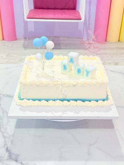 Blue Balloon Baby Shower Cake with baby block toppers and pastel buttercream design for boy baby shower celebrations in Dubai