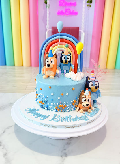 Bluey family cake with cartoon style figures and rainbow design