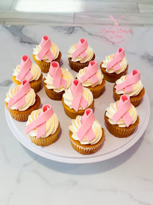 Breast Cancer Cupcakes Dubai with pink awareness decoration by Dreamy Delights by Sidra
