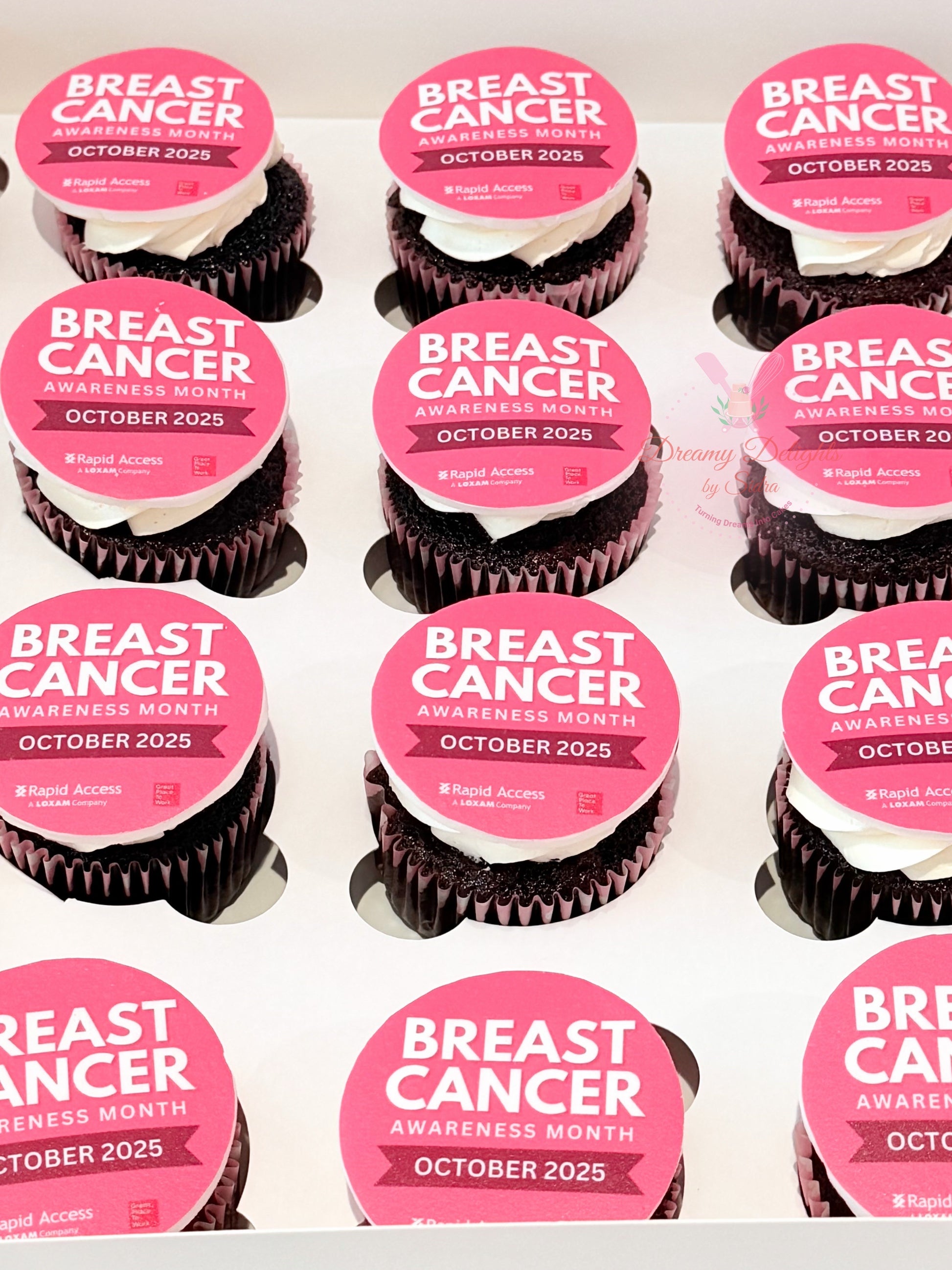 Breast cancer awareness themed cupcakes with custom edible toppers in Dubai