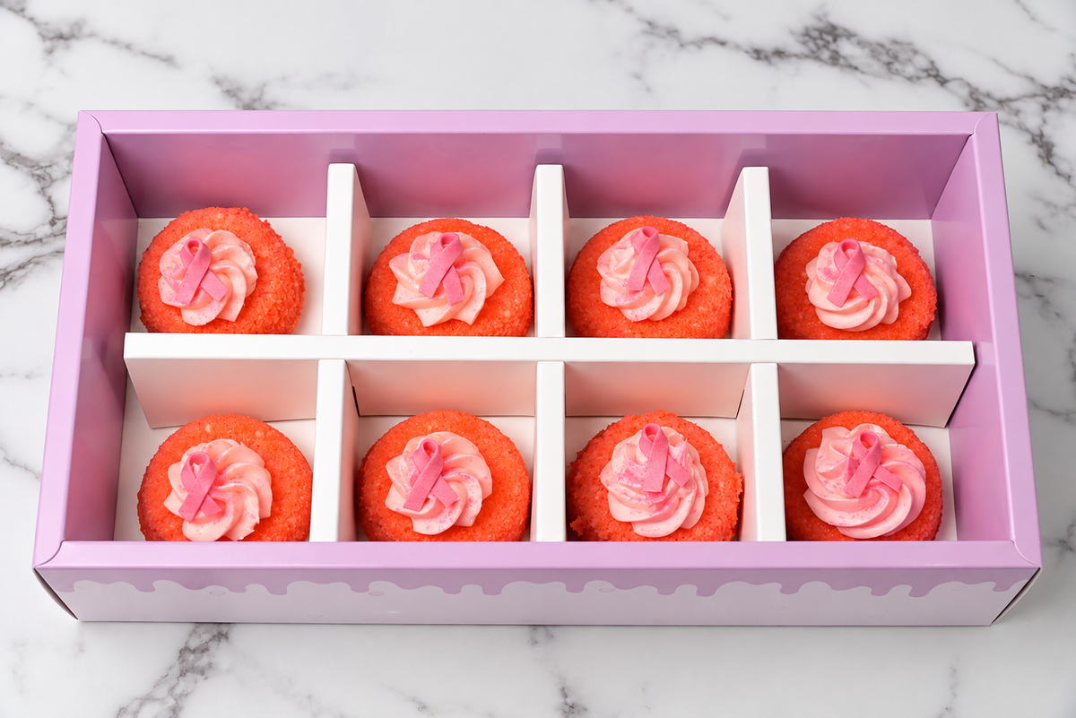 Pink velvet breast cancer awareness cake bites with pink ribbons in Dubai
