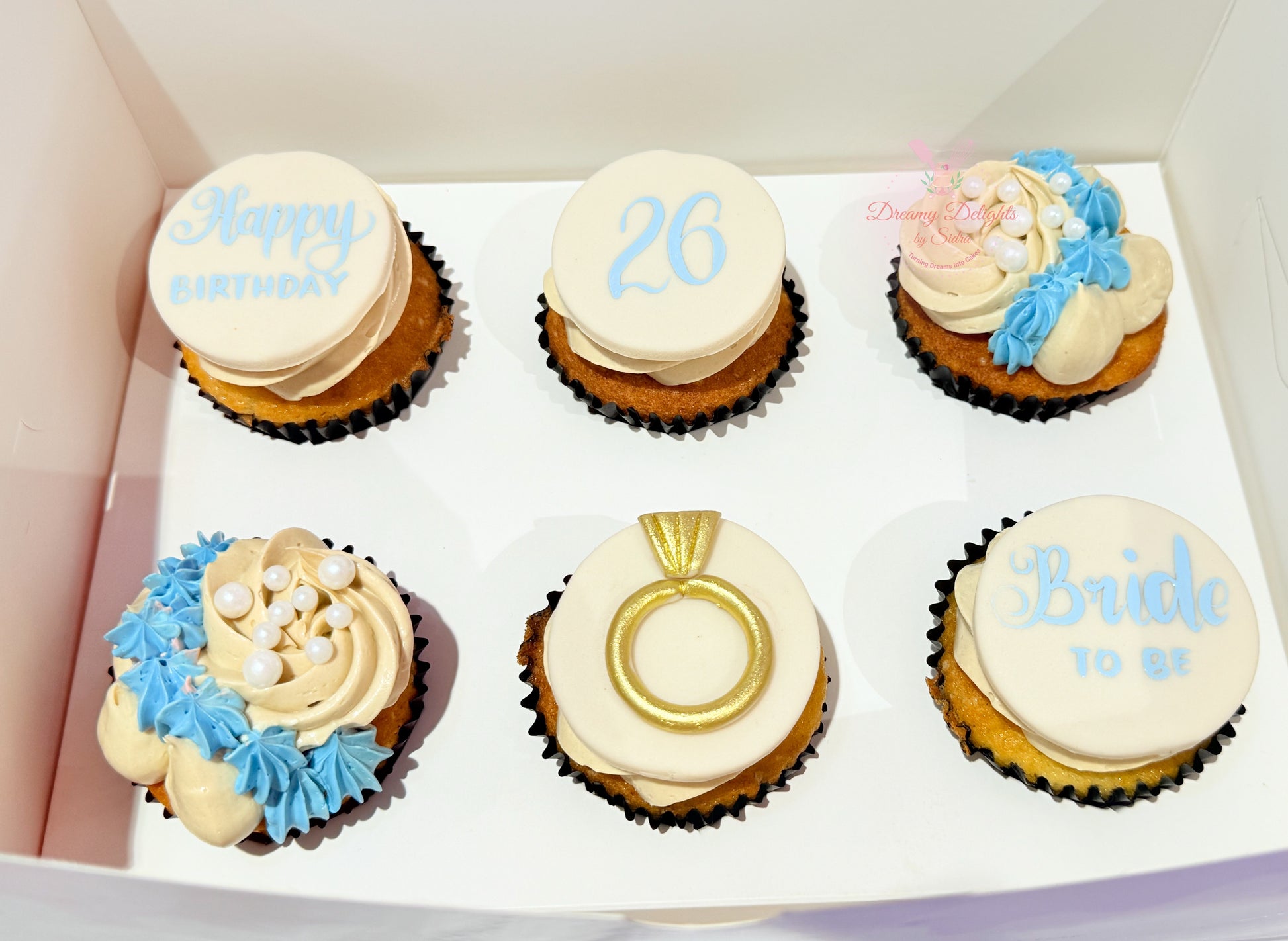 Bride to be cupcakes with engagement ring topper for bridal shower party in Dubai