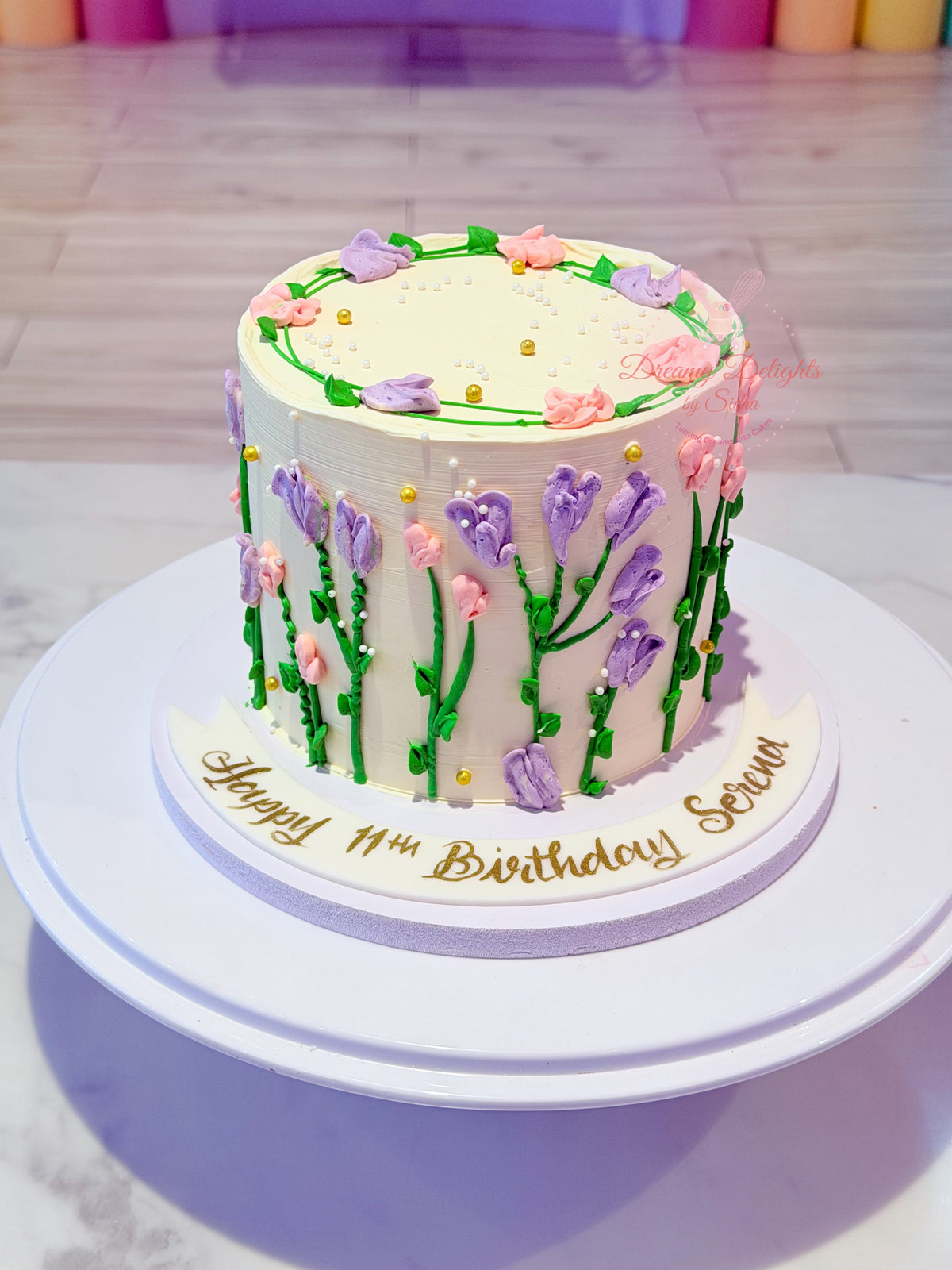 Elegant cake for her Dubai with pink and purple buttercream flowers by Dreamy Delights by Sidra
