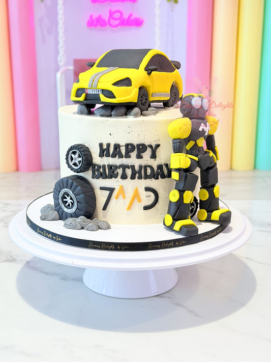 Cake for him Dubai featuring a yellow car, robot character and birthday details by Dreamy Delights by Sidra
