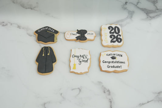 Class of 2026 graduation cookies with graduation cap, diploma, and graduation gown designs for school and university graduation celebrations in Dubai