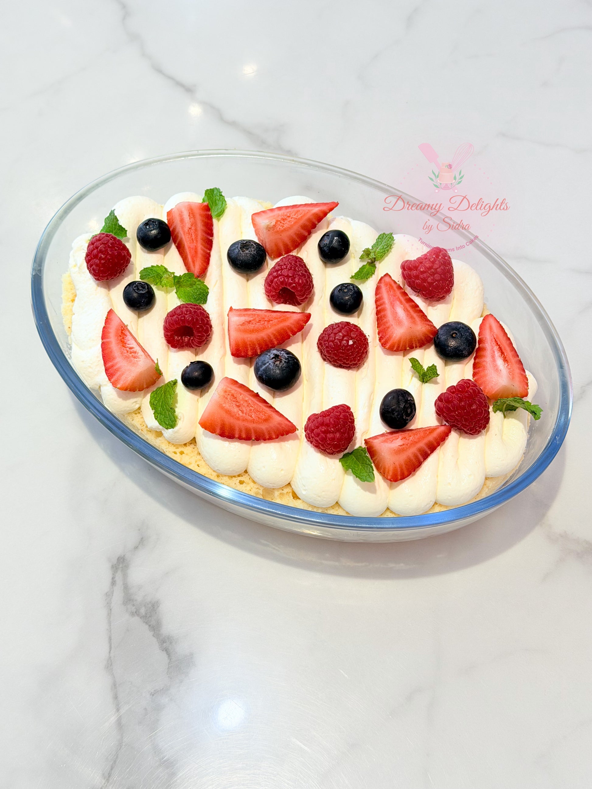 Classic milk cake dessert tray with soft texture and milk soaked layers for serving in Dubai