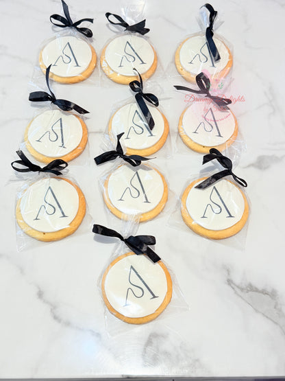 Corporate logo cookies individually packed with ribbon for branded event gifting in Dubai