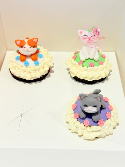 Cute cat theme birthday cupcakes with fondant kitten toppers for kids party in Dubai