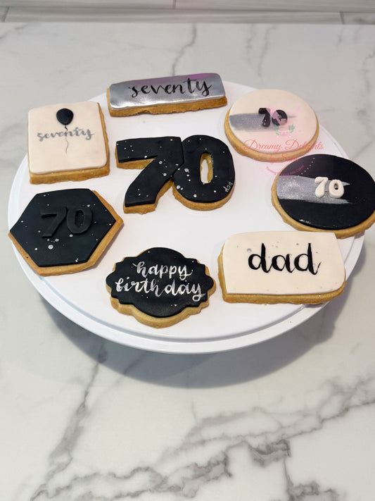 Elegant Dad 70th birthday cookies with black white and silver designs