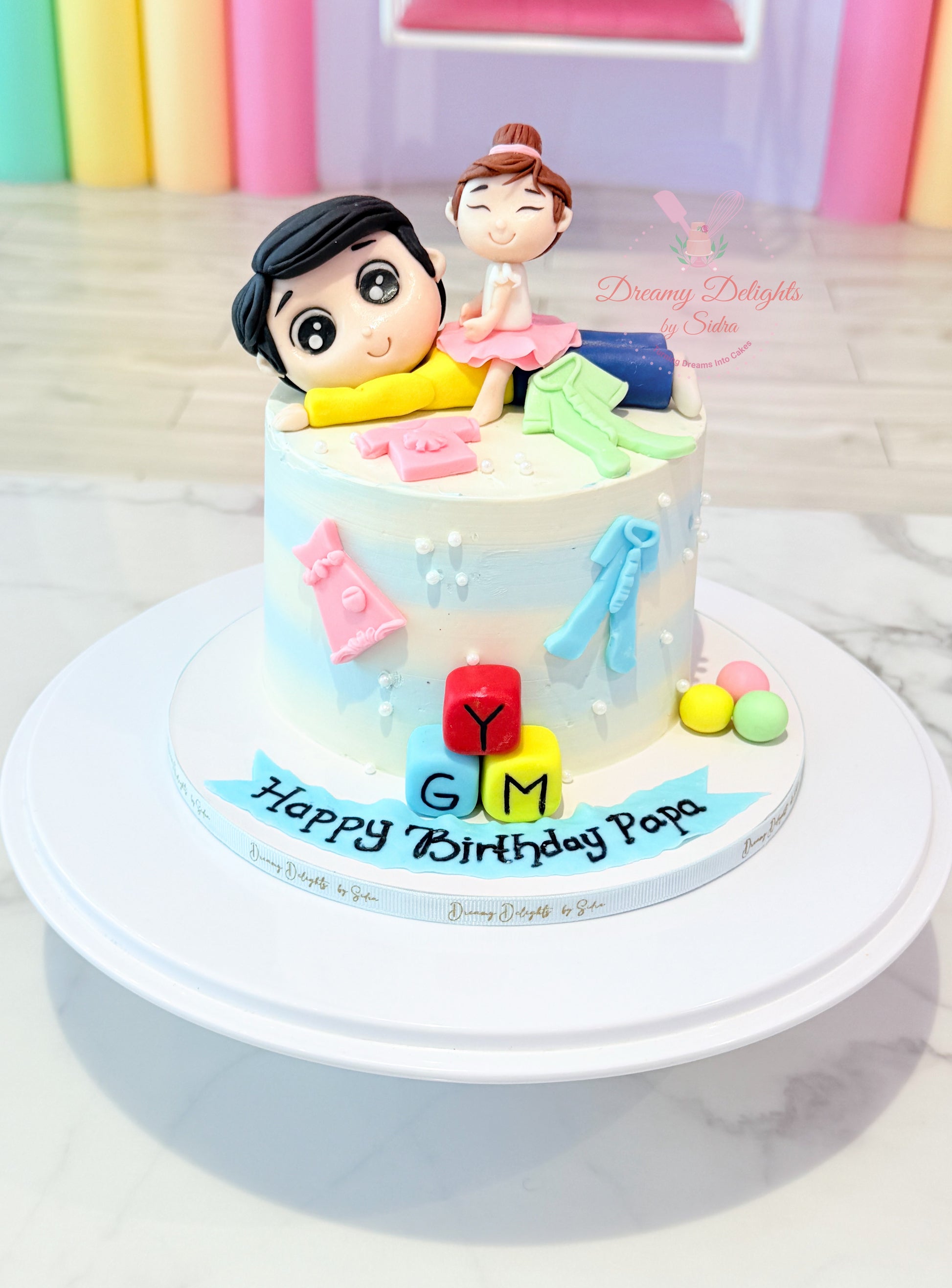 Dad birthday cake with fondant father and child design for him celebration in Dubai