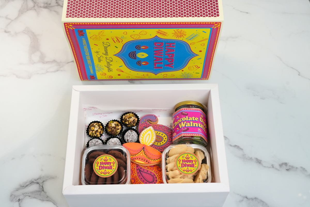 Diwali gift box Dubai with festive cookies, date balls and chocolate walnuts by Dreamy Delights by Sidra