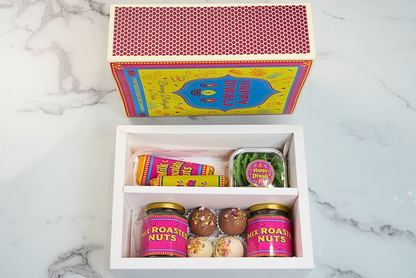 Diwali nutty chocolate gift hamper with chocolate bars, Sable cookies, roasted nuts and truffles by Dreamy Delights by Sidra in Dubai