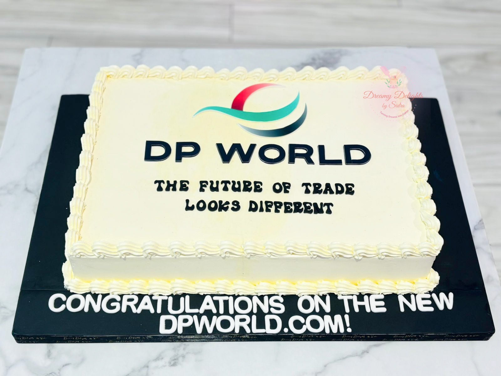 DP World logo corporate cake designed for company celebration event in Dubai