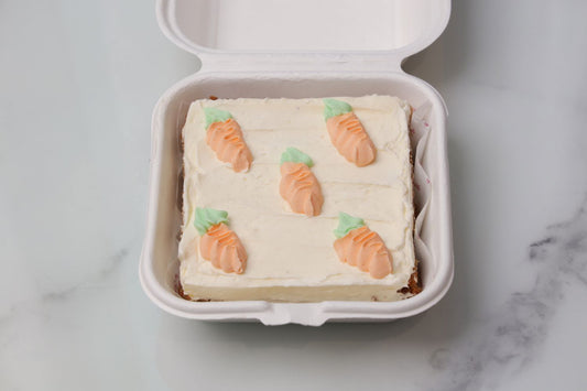 Easter bento cake Dubai with carrot design and cream frosting