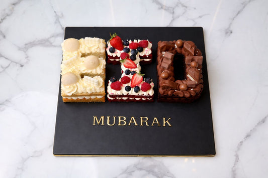 Eid Mubarak letter cake with three cake letters festive Eid cake Dubai