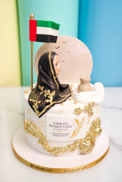 Emirati Women's Day cake with UAE flag, Emirati woman and gold decorations