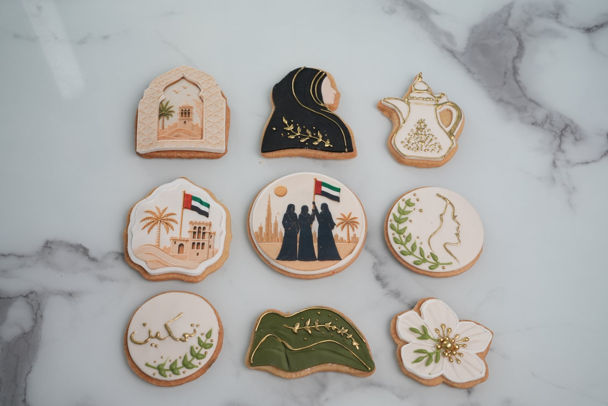 Emirati Women's Day cookies with UAE-inspired designs and gold details