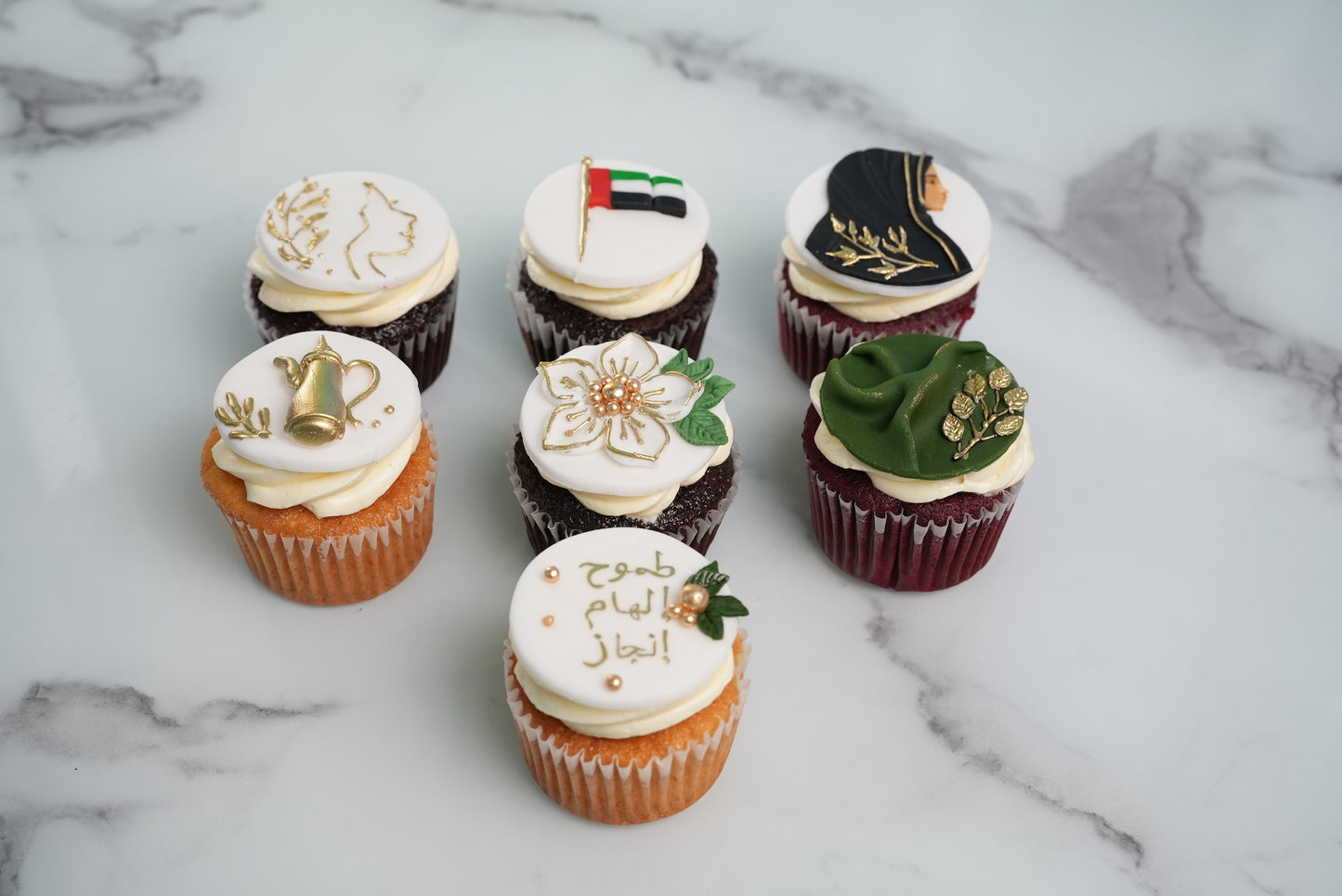 Emirati Women's Day cupcakes gift with UAE-inspired designs and gold details