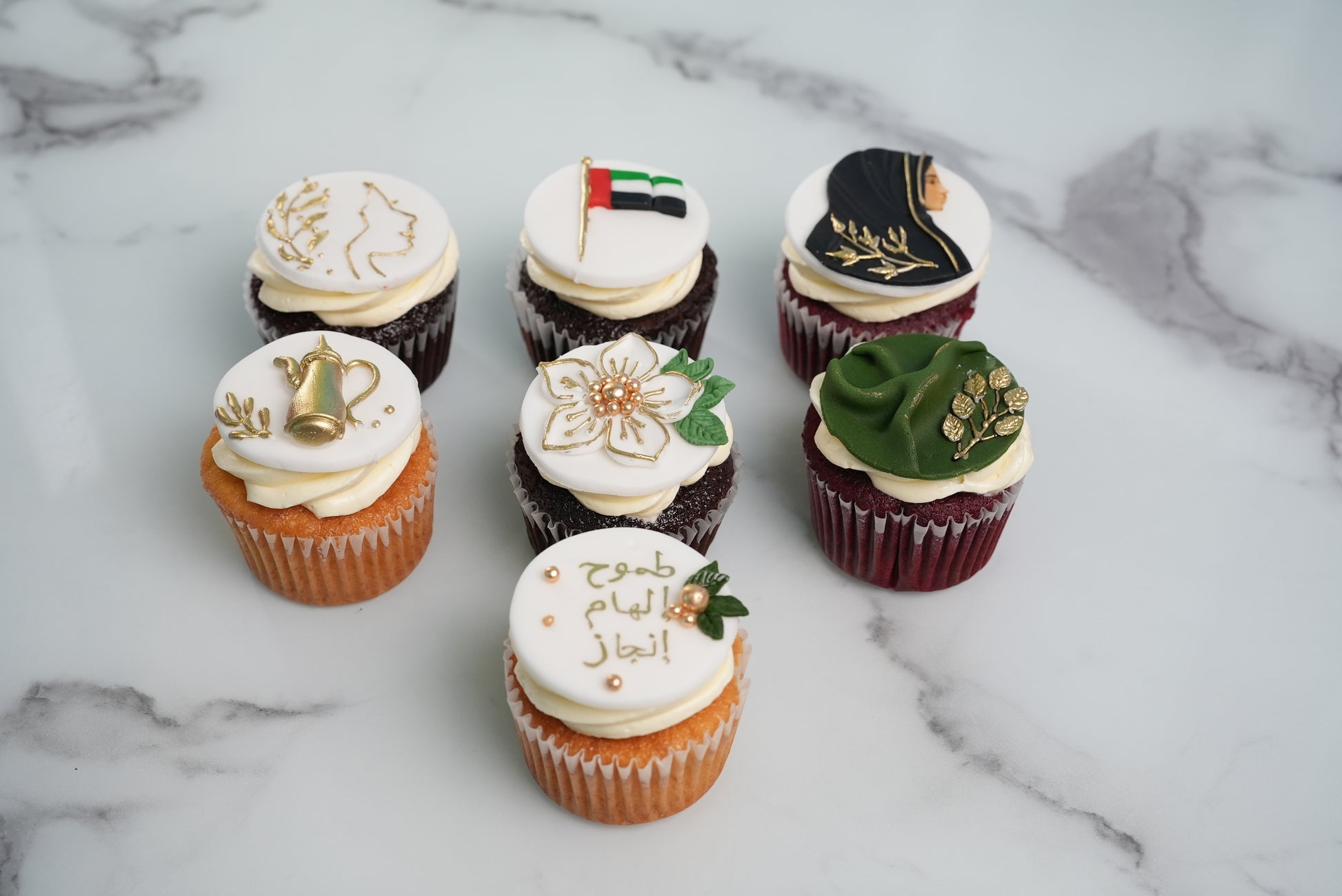 Emirati Women's Day cupcakes gift with UAE-inspired designs and gold details