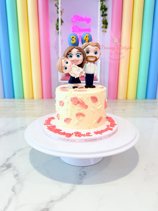 Family cake with custom fondant figurines and buttercream finish