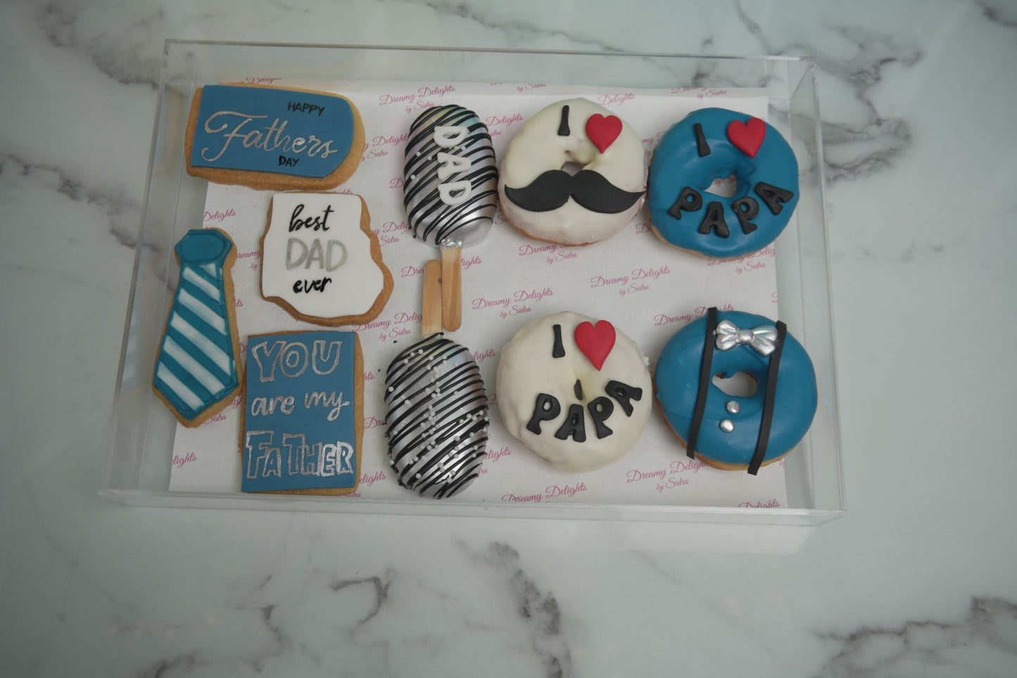 Father's Day Acrylic Tray Bento Bundle with cookies, donuts, and cakesicles in a luxury dessert gift box for Father's Day 2026 in Dubai