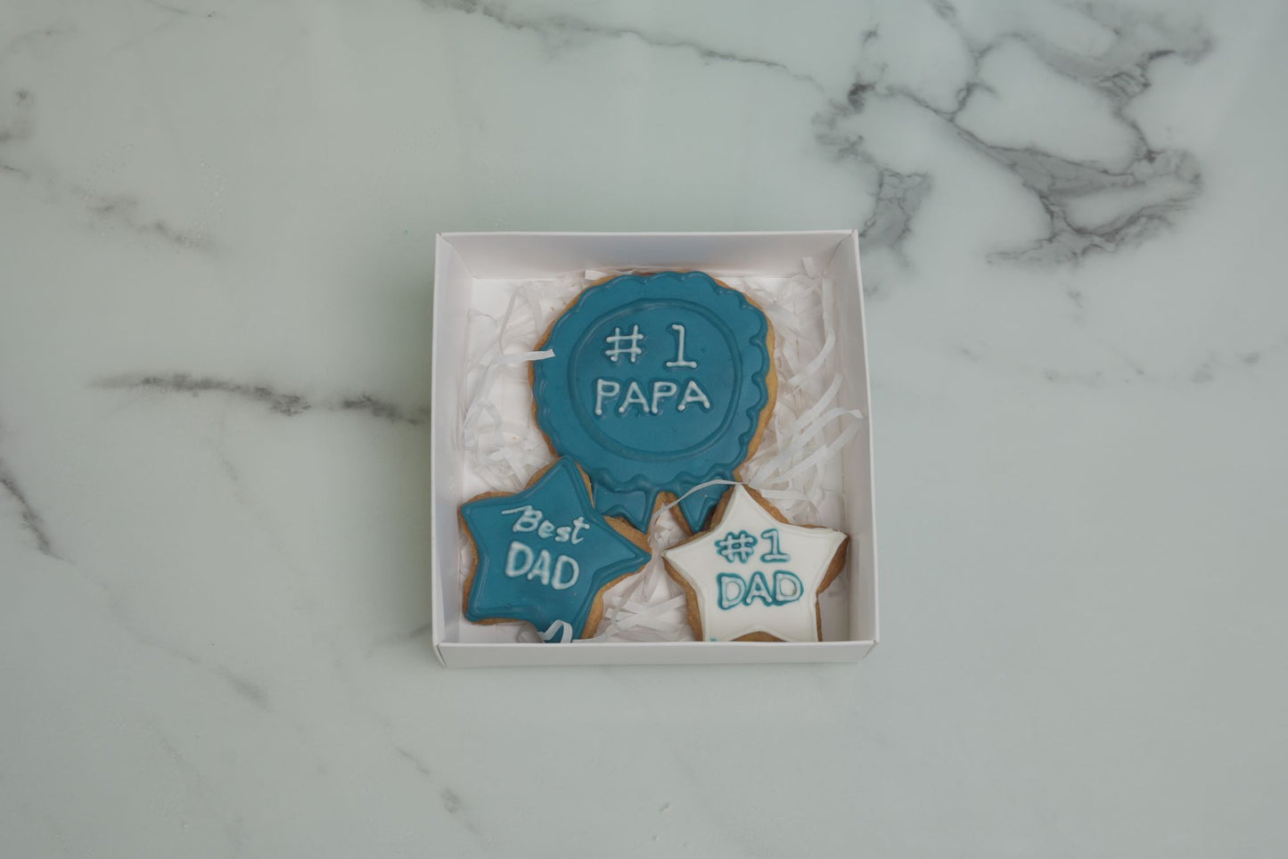 Father's Day Cookie Set of 3 featuring #1 Papa, Best Dad, and #1 Dad decorated cookies in a gift box for Father's Day 2026 in Dubai