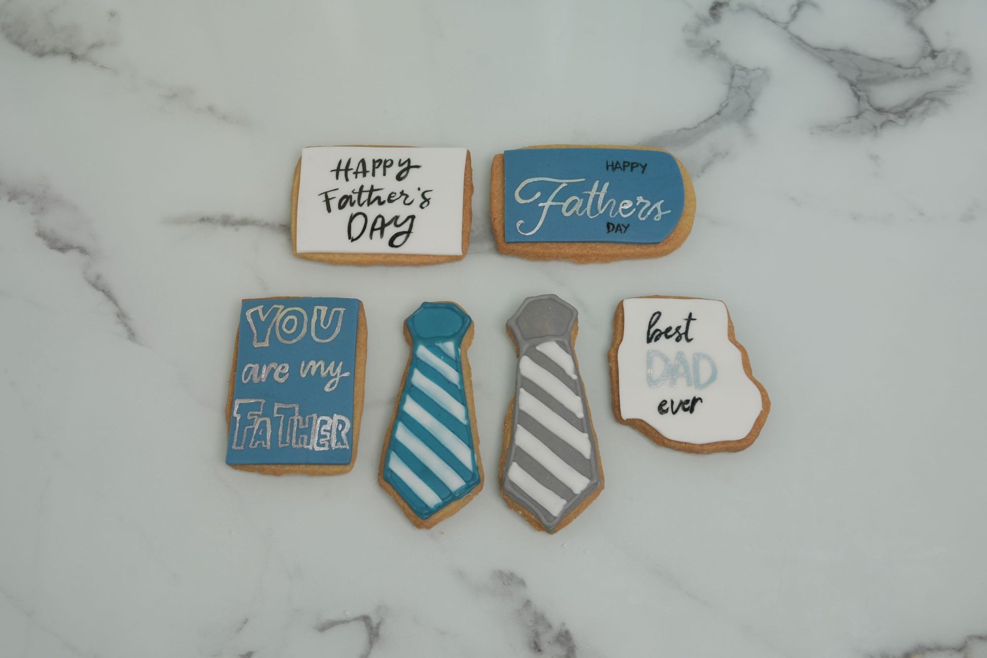 Father's Day Tie Cookies featuring necktie designs, Father's Day messages, and Best Dad decorations in Dubai for Father's Day 2026