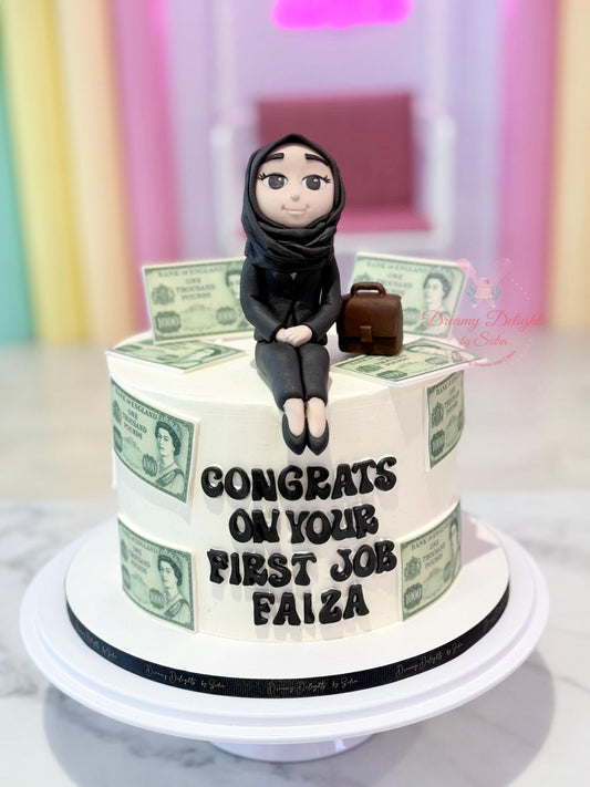 Cake with a figurine of a person wearing a hijab, holding money, and a suitcase, with text 'Congrats on your first job Faiza'.