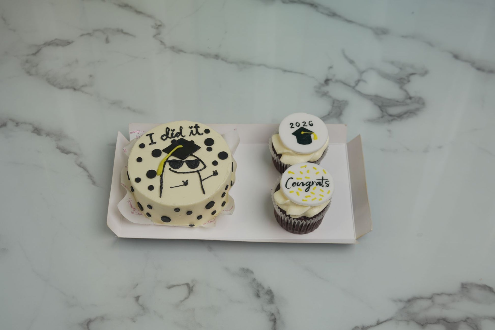 Graduation Bento Bundle with graduation cake and cupcakes decorated for Class of 2026 graduation celebrations and school graduation parties