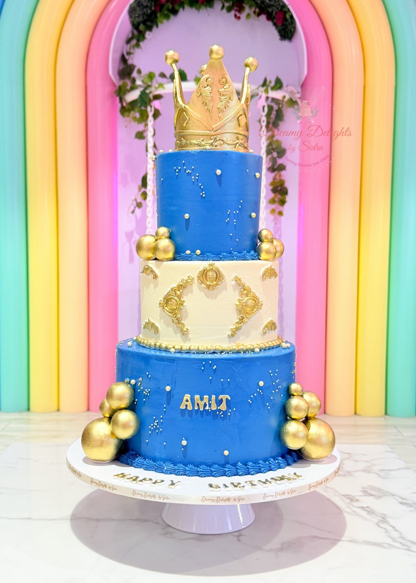 Grand crown birthday cake with royal gold topper for him celebration in Dubai