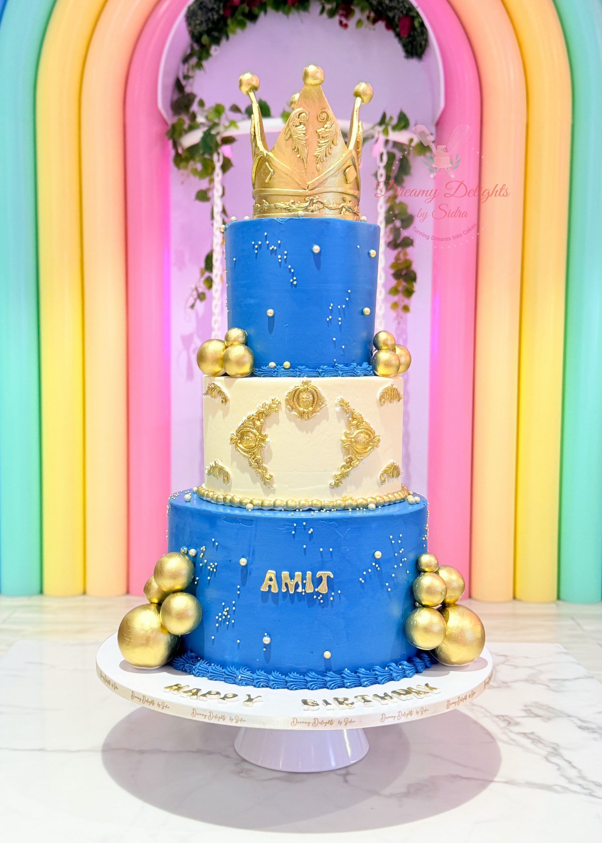 Grand crown birthday cake with royal gold topper for him celebration in Dubai