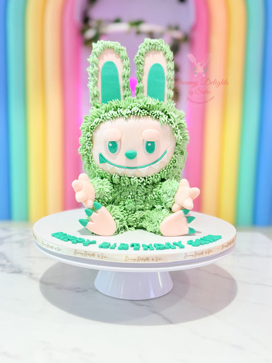 Green Labubu birthday cake for girls, custom kids birthday cake Dubai with themed fondant design
